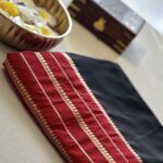 Premium mysore semi crepe - Black with red zari border ZAR527